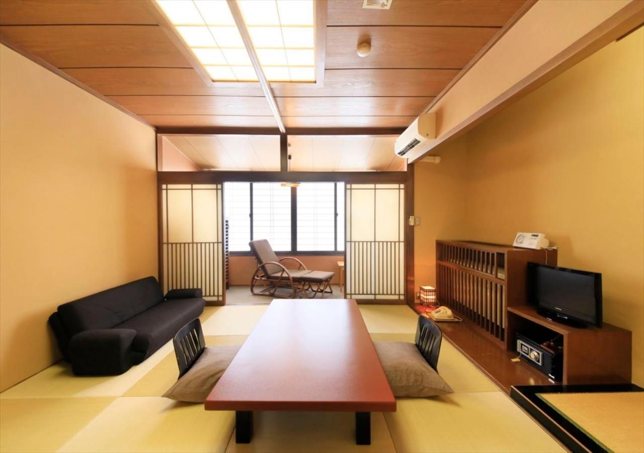 Отель Saikatei Jidaiya Kaminoyama Номер фото